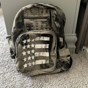Tie dye. Studded. Flag backpack.
